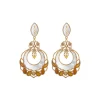 Capraia pierced stud earrings - white